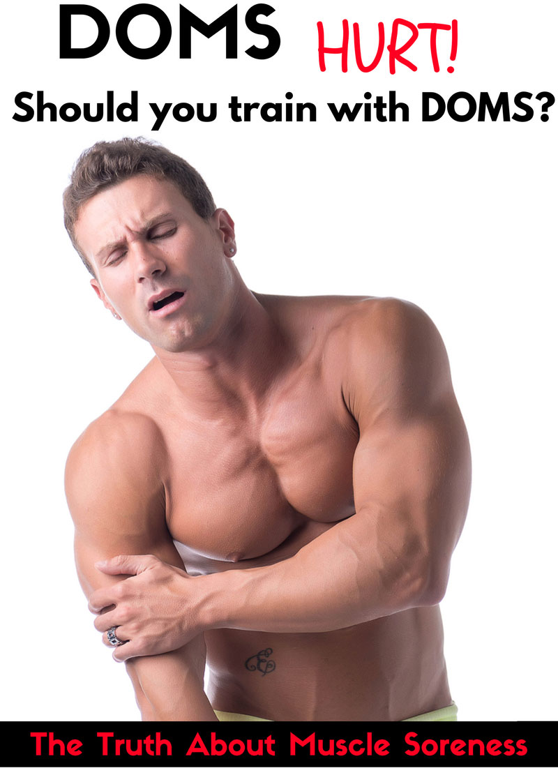 Man experiencing DOMS muscle soreness after exercise and holding his sore arm following a workout.